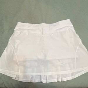 SOLD 
Lululemon White Pace Setter Skirt -
Pleated Tennis Skirt Size 6